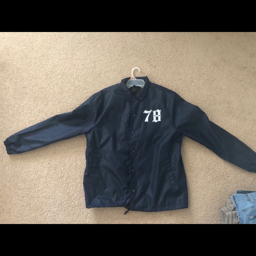 Divided navy windbreaker